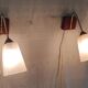 Vintage wall lights in wood, brass and glass - mid. 20th century