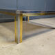 Table basse vintage en chrome et laiton dans le style de Romeo Rega, années 1970.