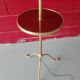 Lampadaire doré tripode