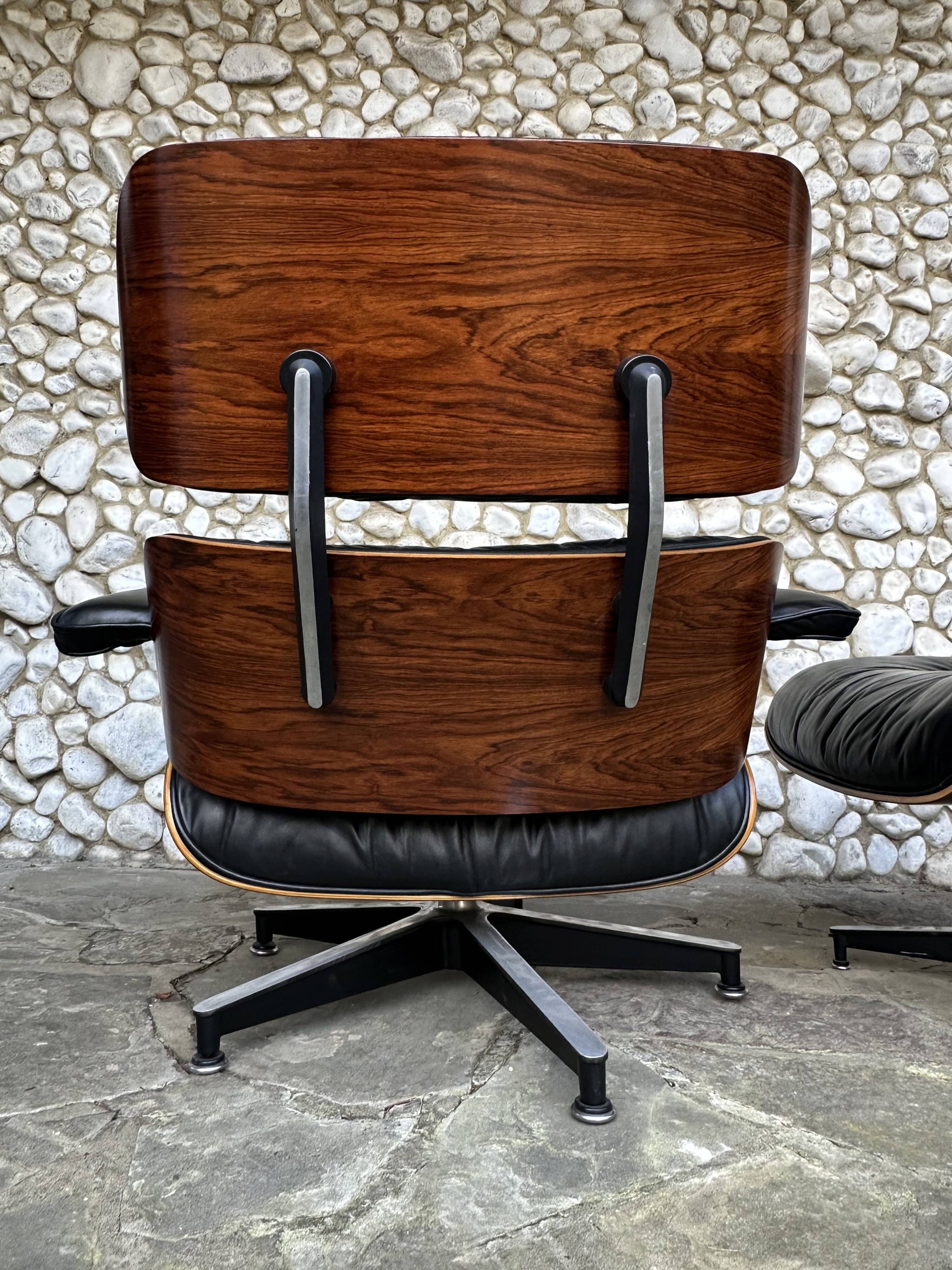 Fauteuil Lounge et ottoman Herman Miller Charles & Ray Eames, palissandre
