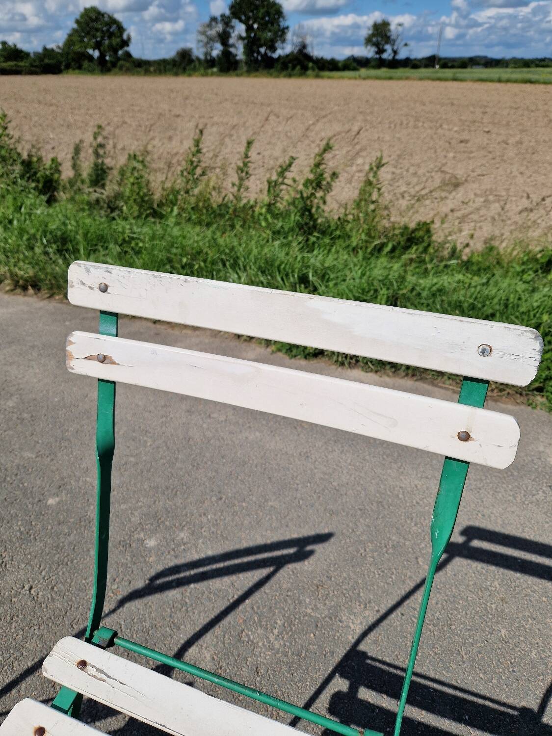 Set of 4 folding wrought iron bistro chairs