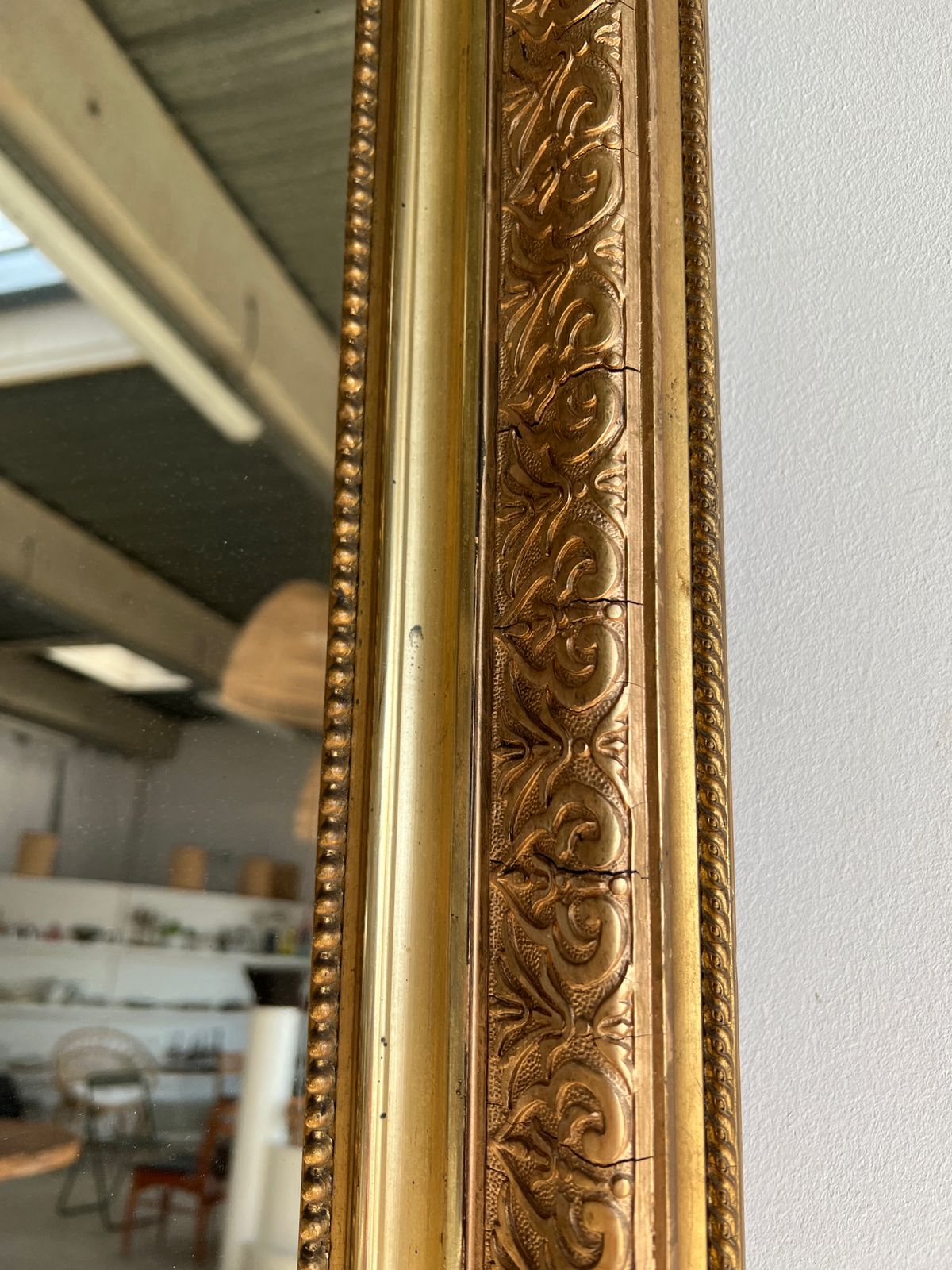 Gilded mirror with frieze h2m10 l:73cm