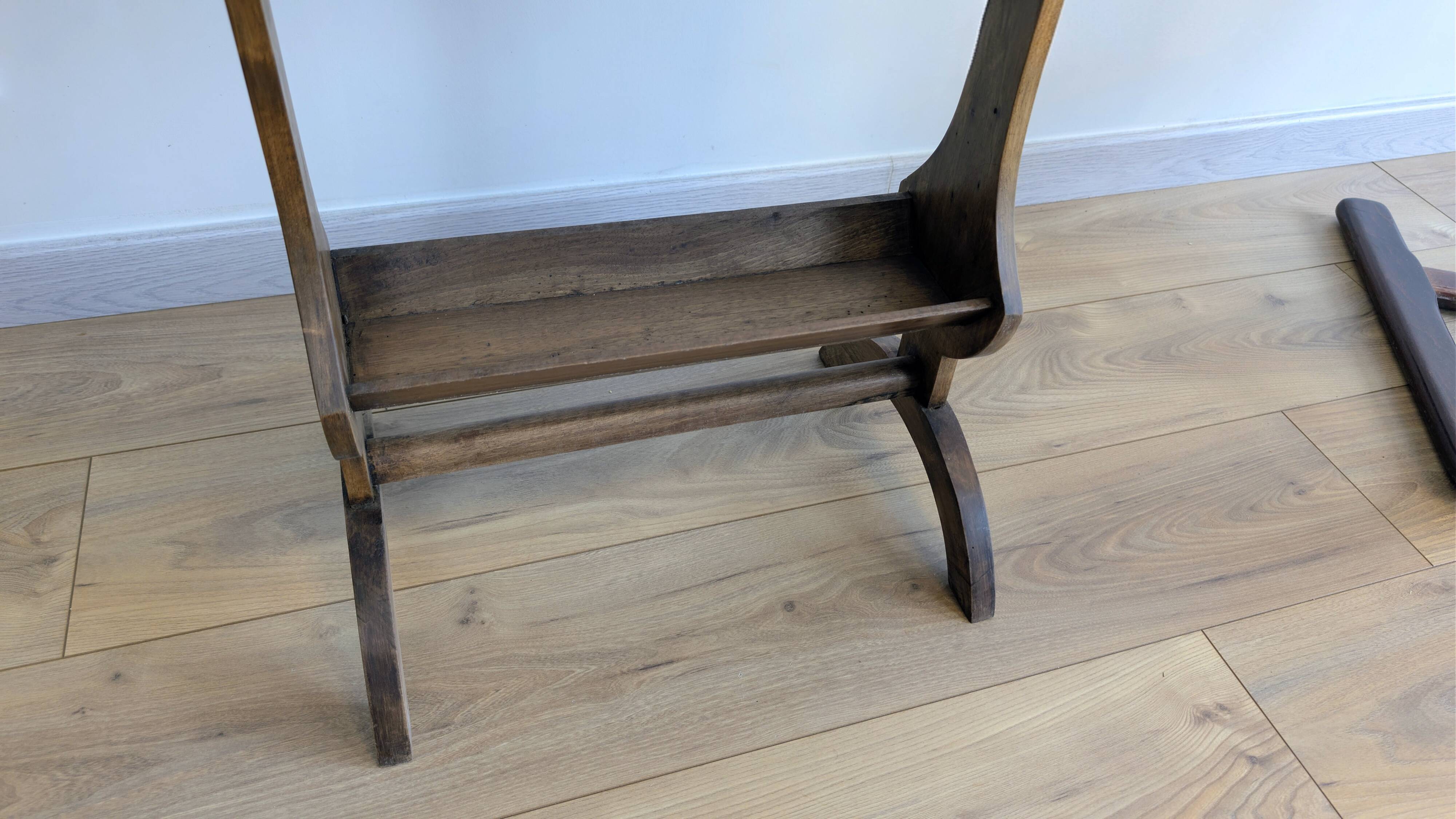 Old wooden pocket emptying table with drawer and planter.
