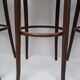 4 curved wood and cane bar stools