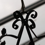 Wrought iron lantern and stained glass windows