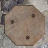 Raw wood tripod stool with octagonal seat