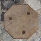 Raw wood tripod stool with octagonal seat