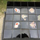 Vintage ceramic coffee table by Guy Trévoux with wrought iron base.