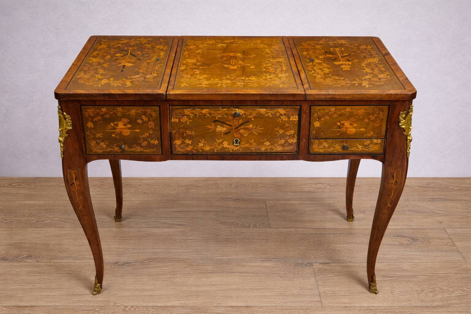Powdered marquetry, French work from the Louis XV Transition period.