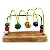 Multicoloured wooden abacus toy.