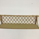 Wall shelf in rattan 50s