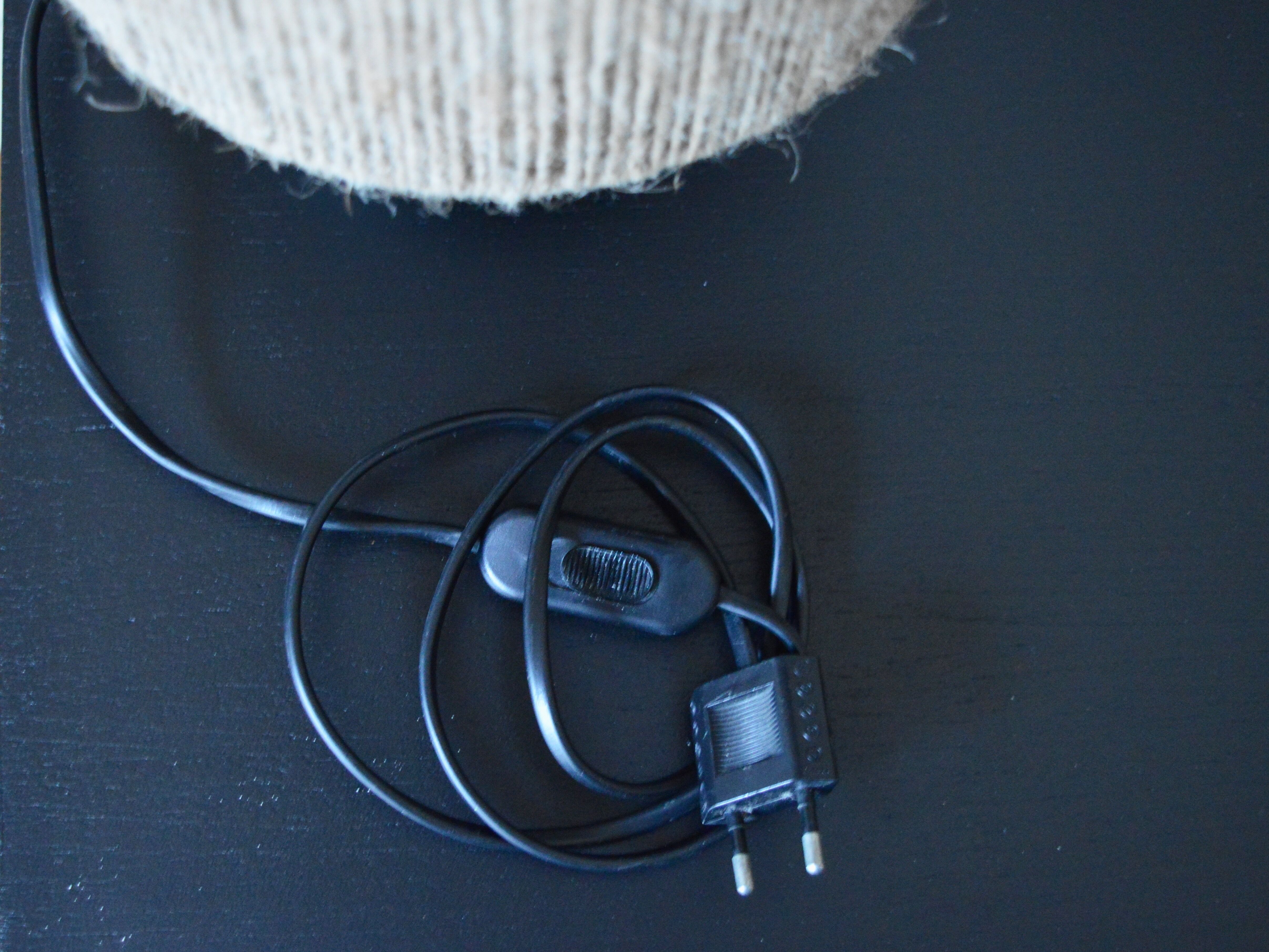 Sandstone and rattan lamp