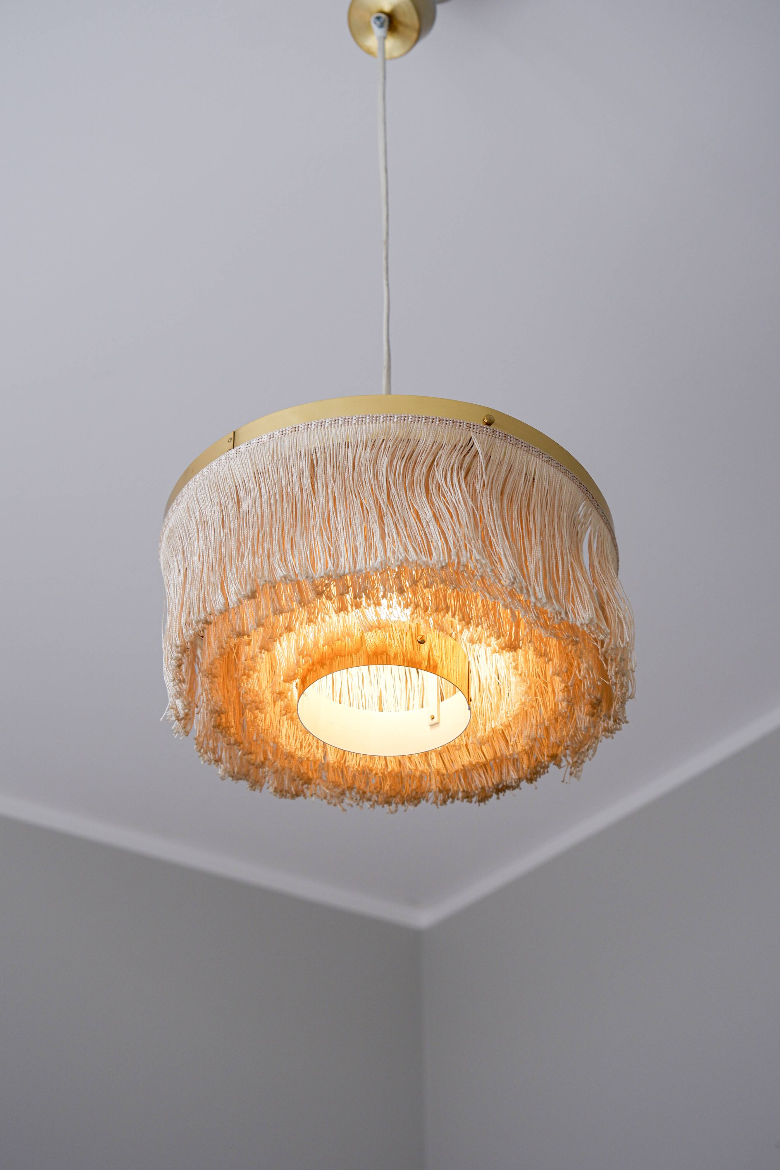Hans Agne Jakobsson silk and brass fringe pendant circa 1960.