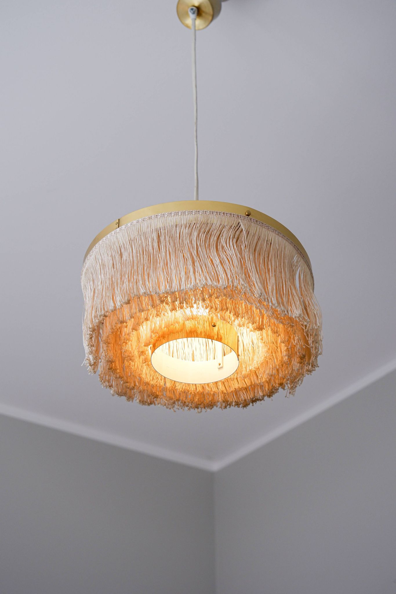 Hans Agne Jakobsson silk and brass fringe pendant circa 1960.