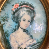 Oval frame with character
