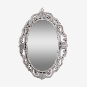 Louis XVI style patinated oval mirror