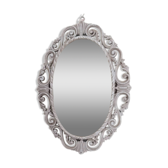 Louis XVI style patinated oval mirror