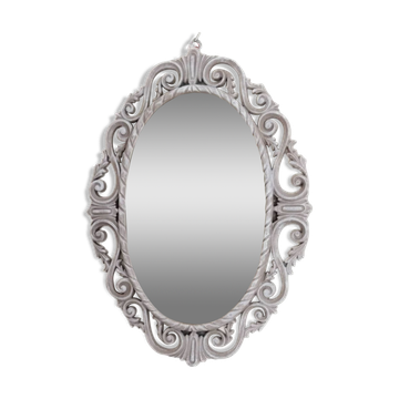 Louis XVI style patinated oval mirror
