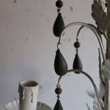 Antique white lacquered metal chandelier with wooden pendants.