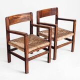 Pair of rustic armchairs in solid wood and straw seats. France, 1940s