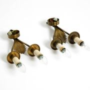 A pair of mid-century modern brass wall lamps by Vereinigte Werkstätten