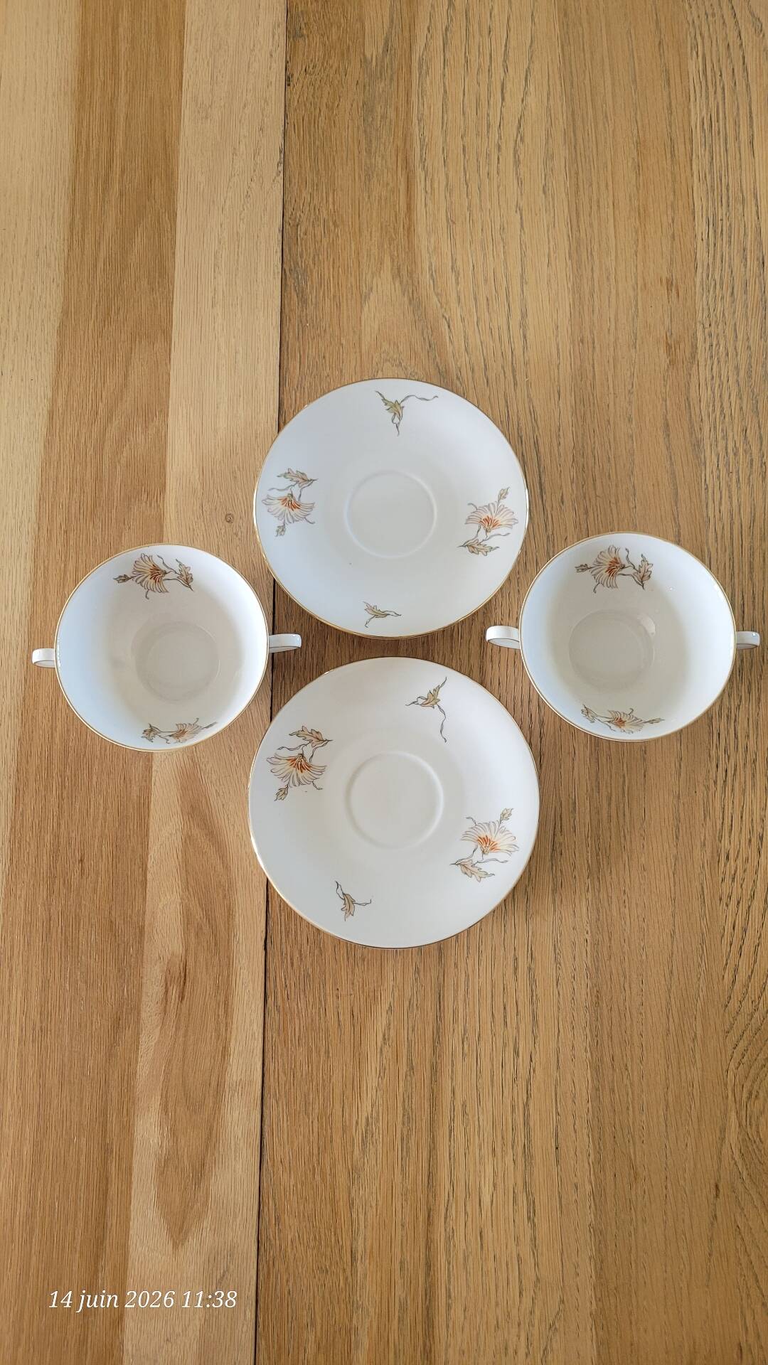 2 large antique cups and their saucers