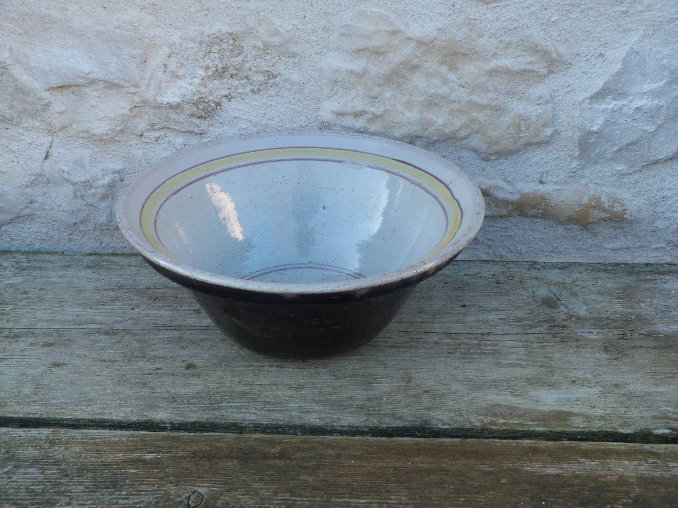 Large hollow salad bowl in glazed earthenware on the inside