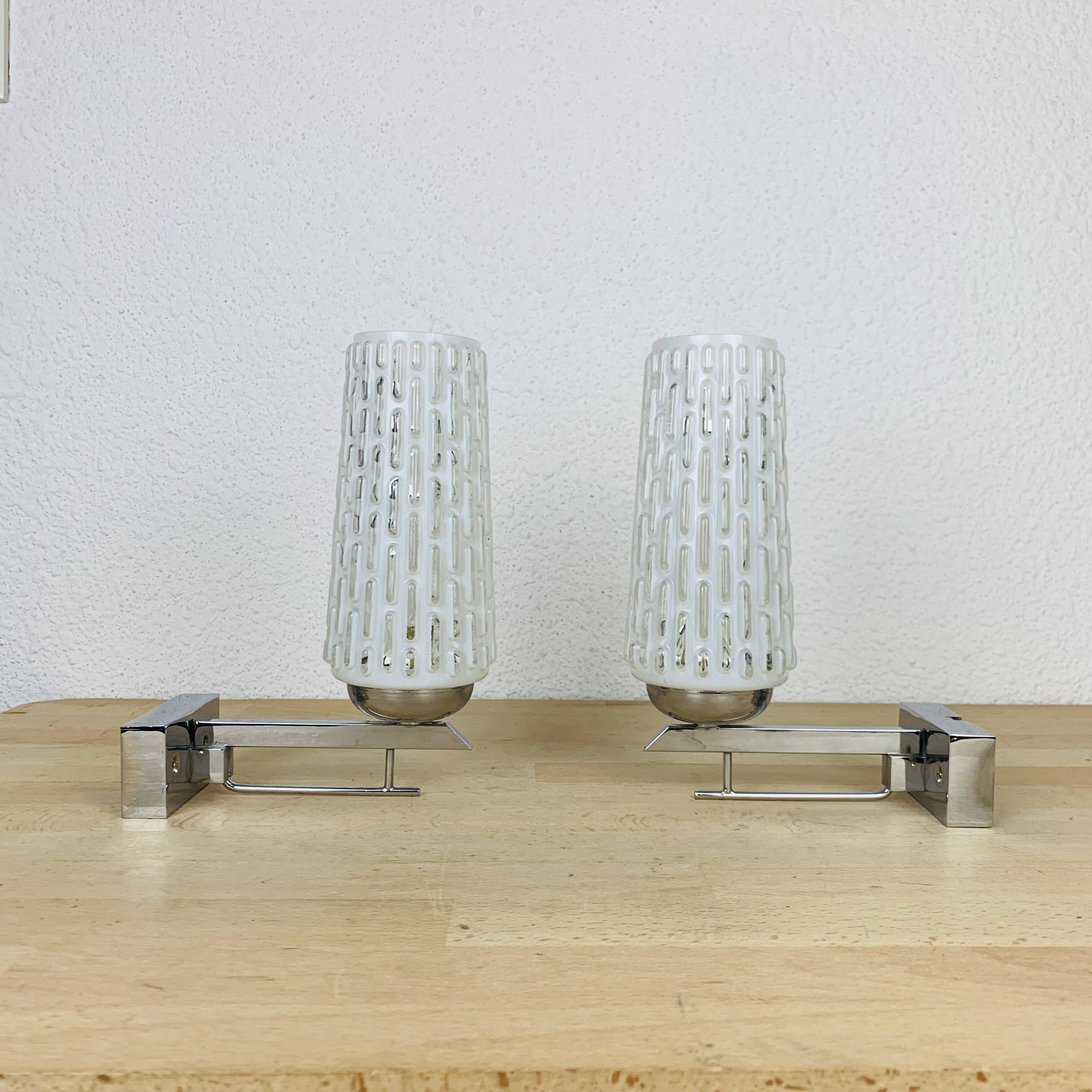 Pair of chrome metal wall lights and opaline tulips from the 70s