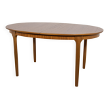 Mid-century extendable oval teak dining table from McIntosh, UK