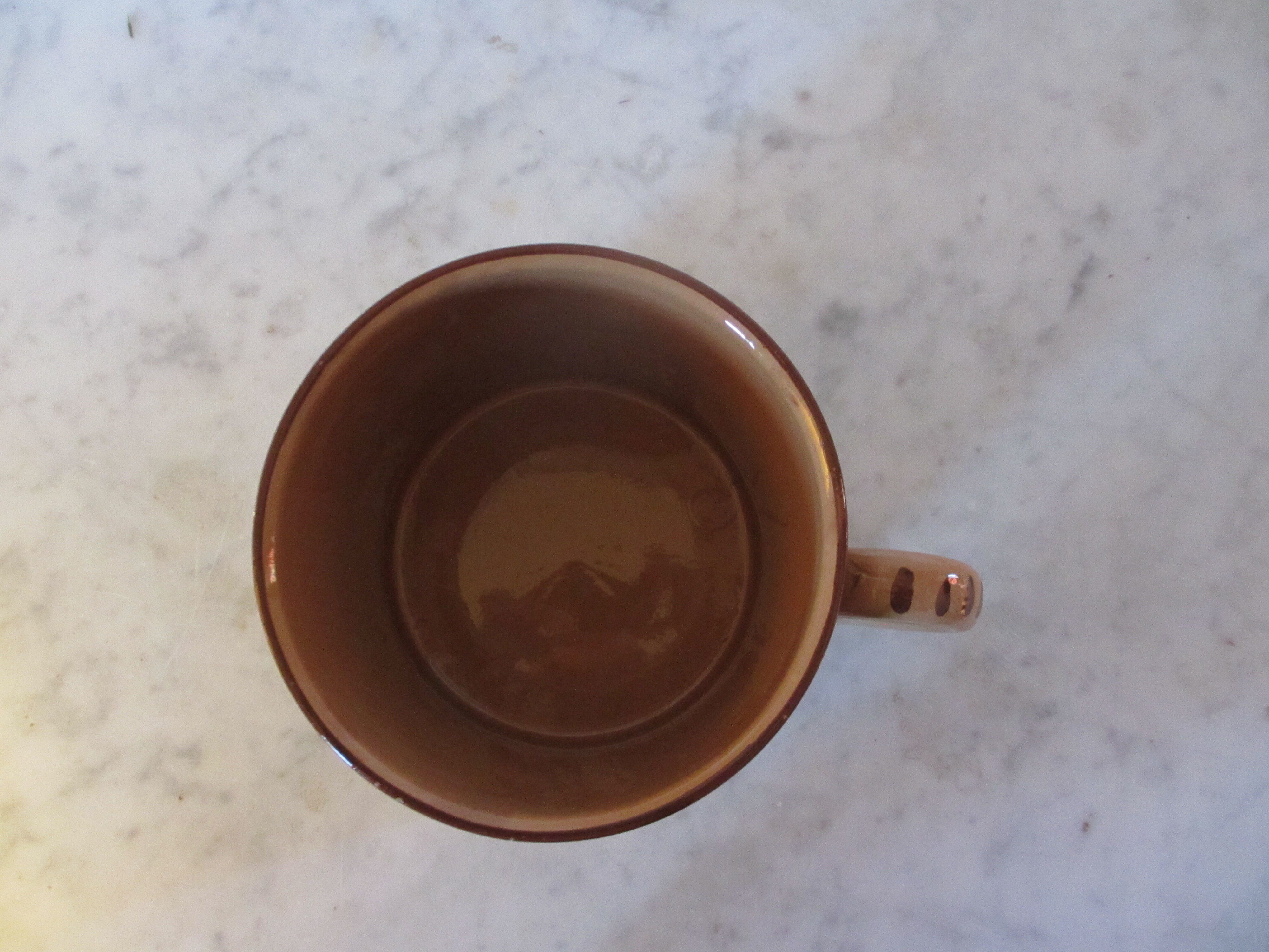 Enamelled earthenware pot