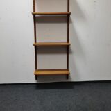 Vintage teak wall system by Poul Cadovious