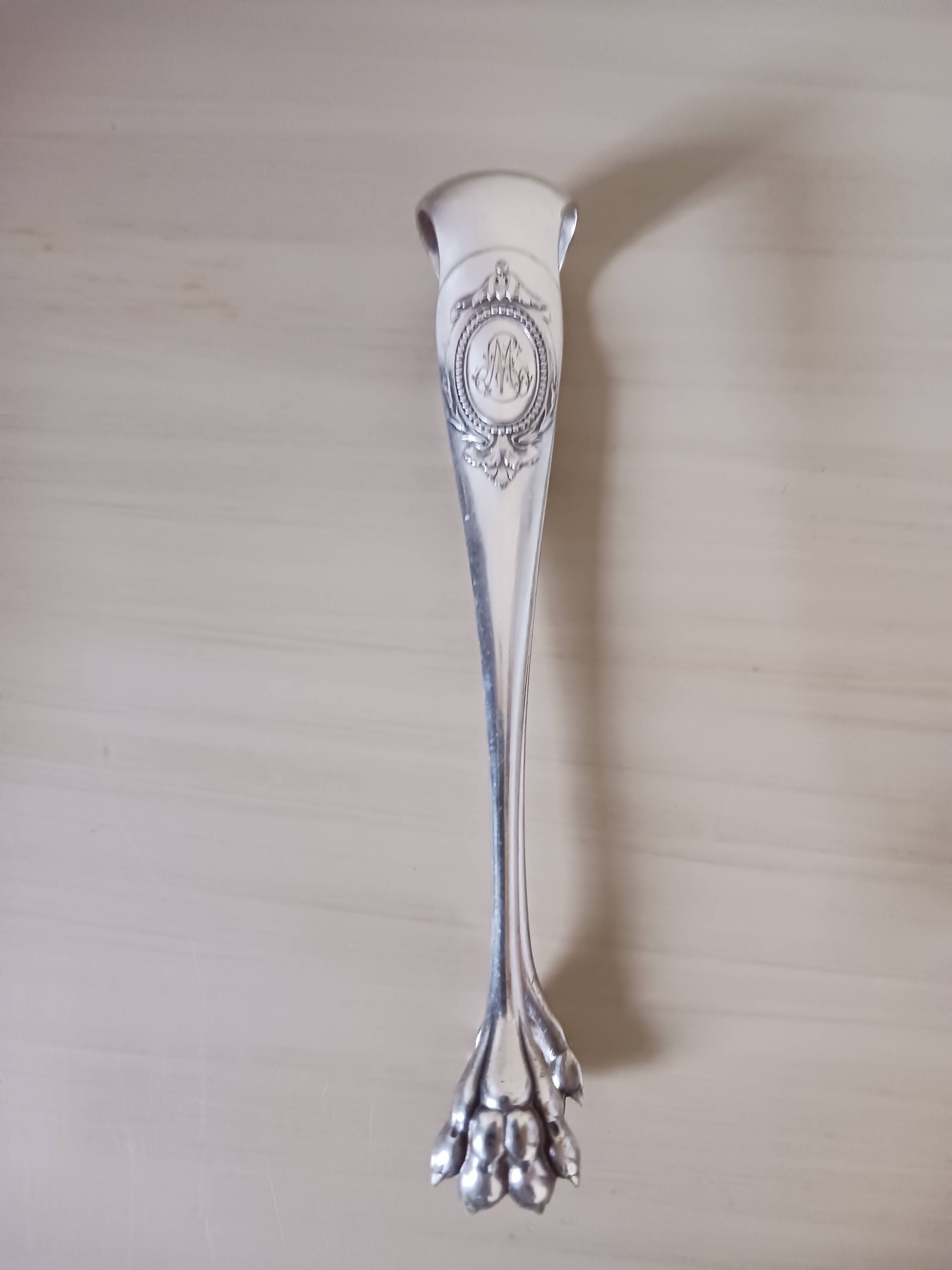 Christofle sugar tongs.