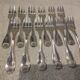 12 silver-plated metal cake forks by silversmith Cailar Bayard, shell design