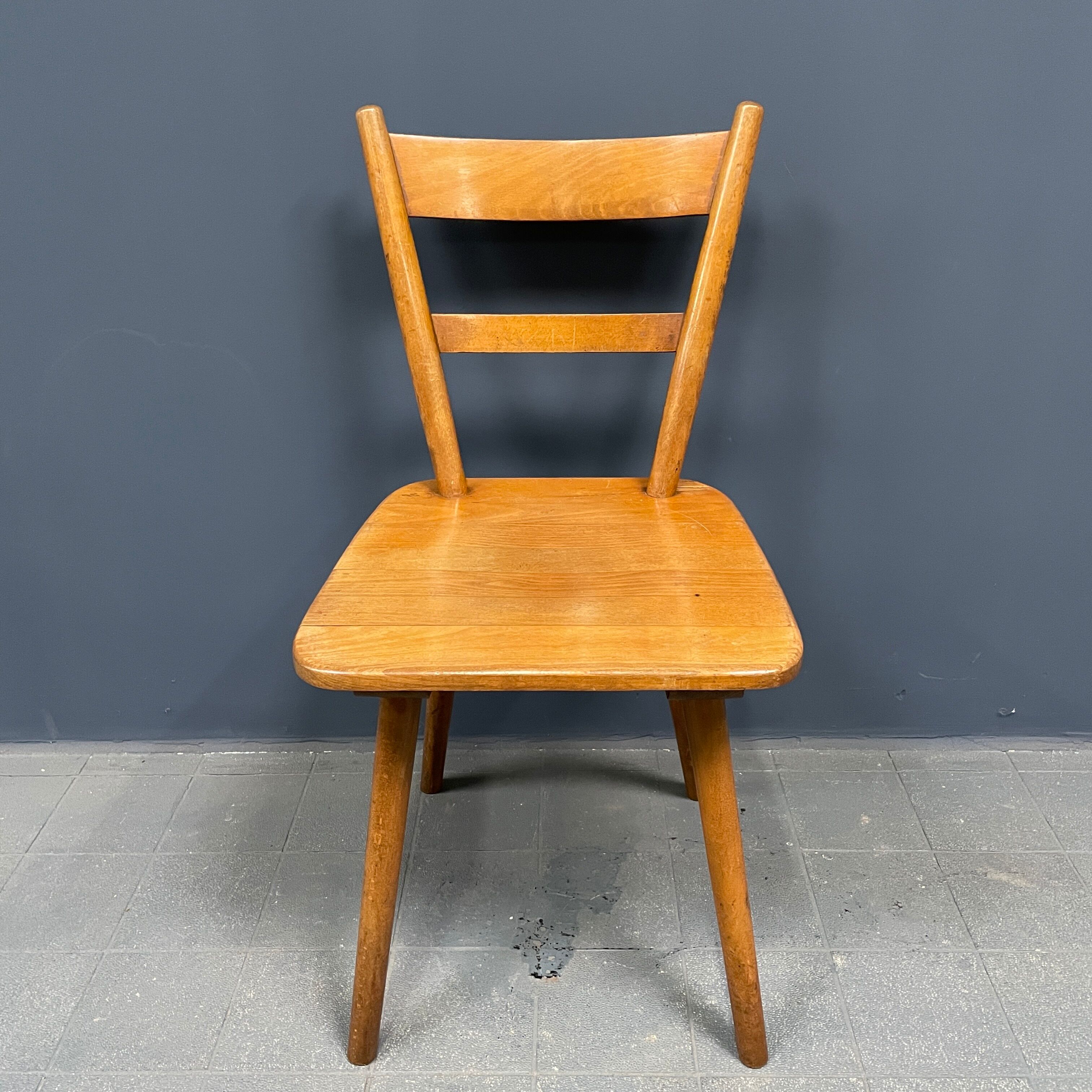 Set of eight german stick chairs from the 1950