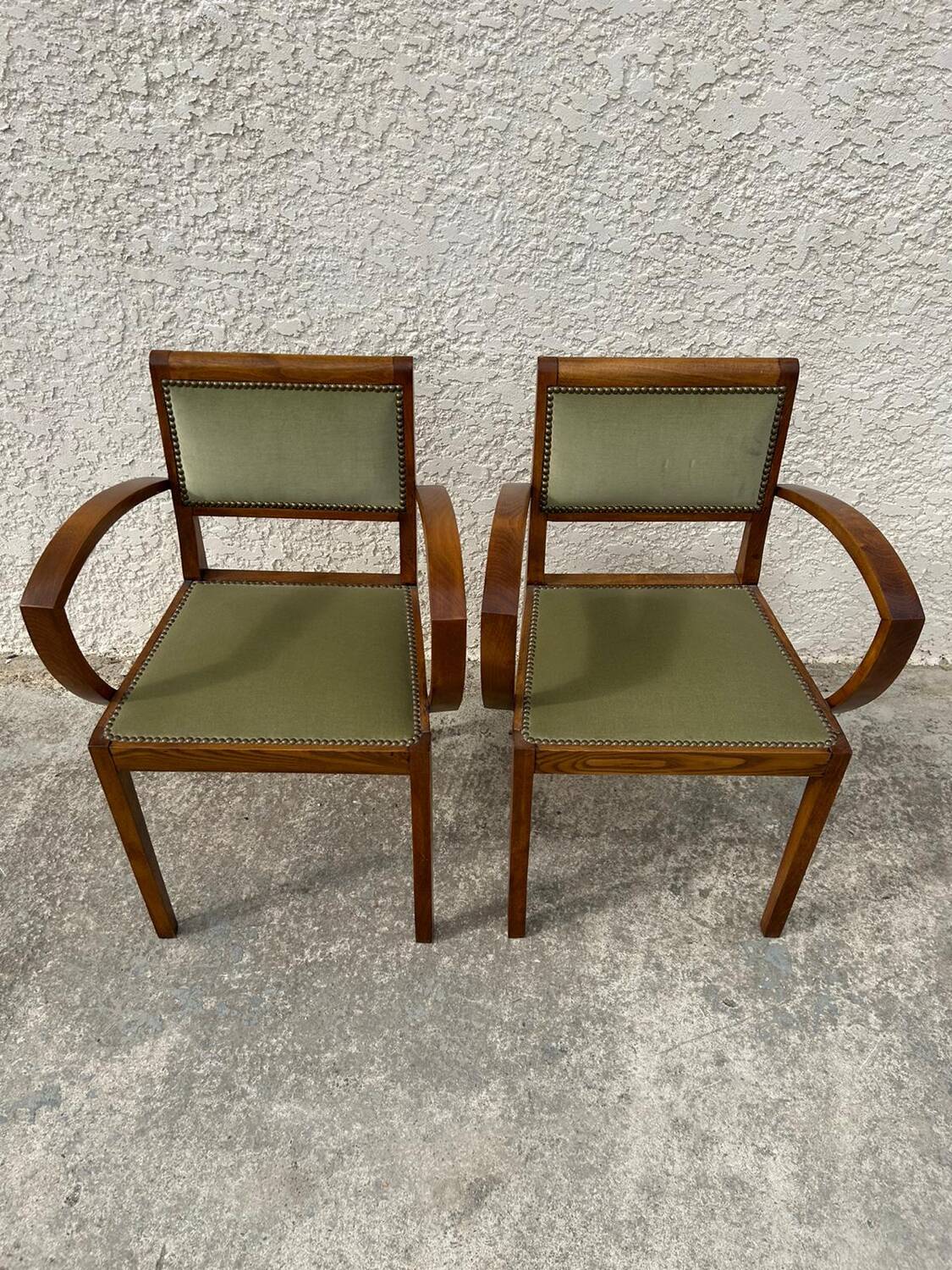 Pair of green velvet bridge armchairs