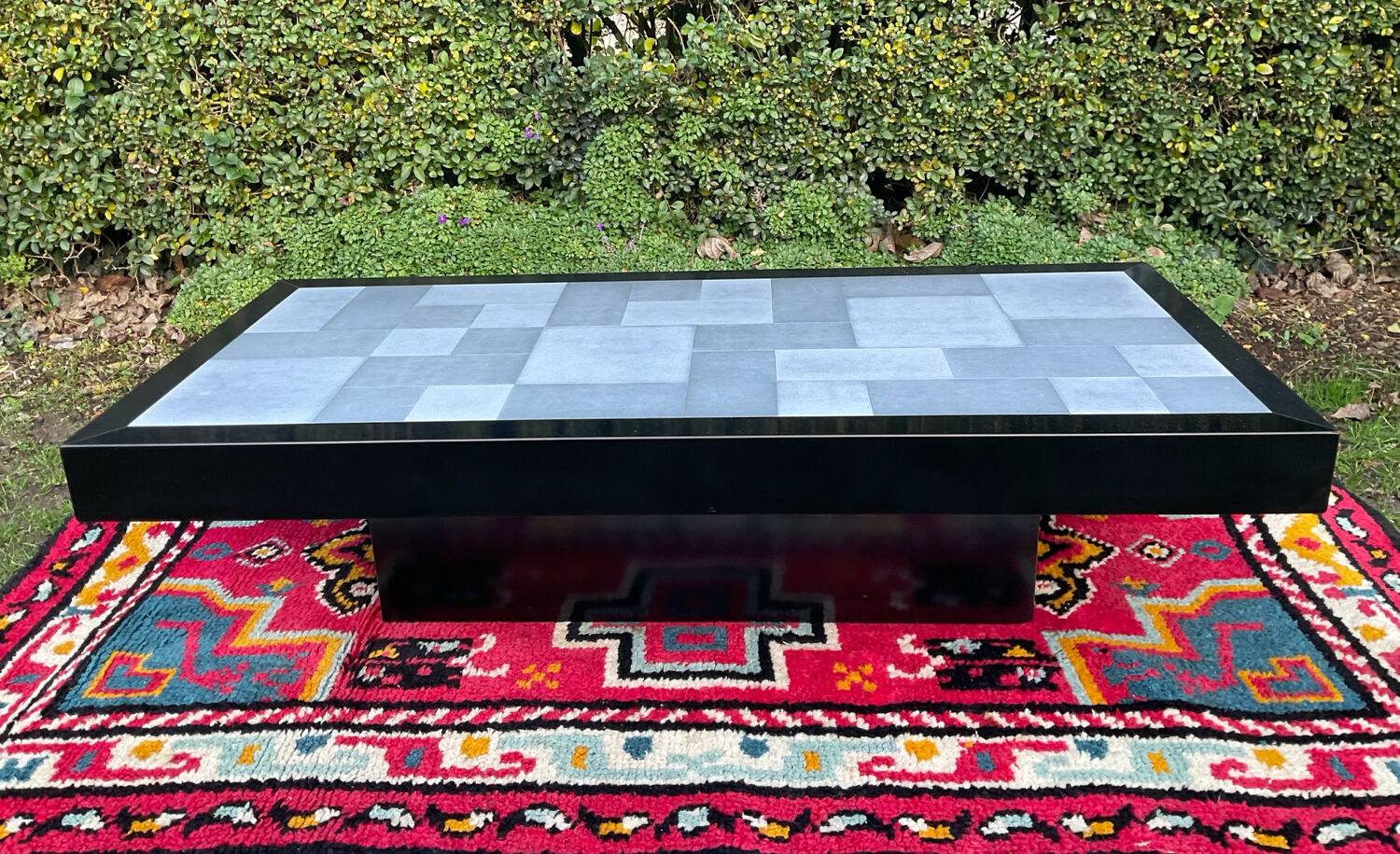 Vintage coffee table in stainless steel and black lacquered wood.