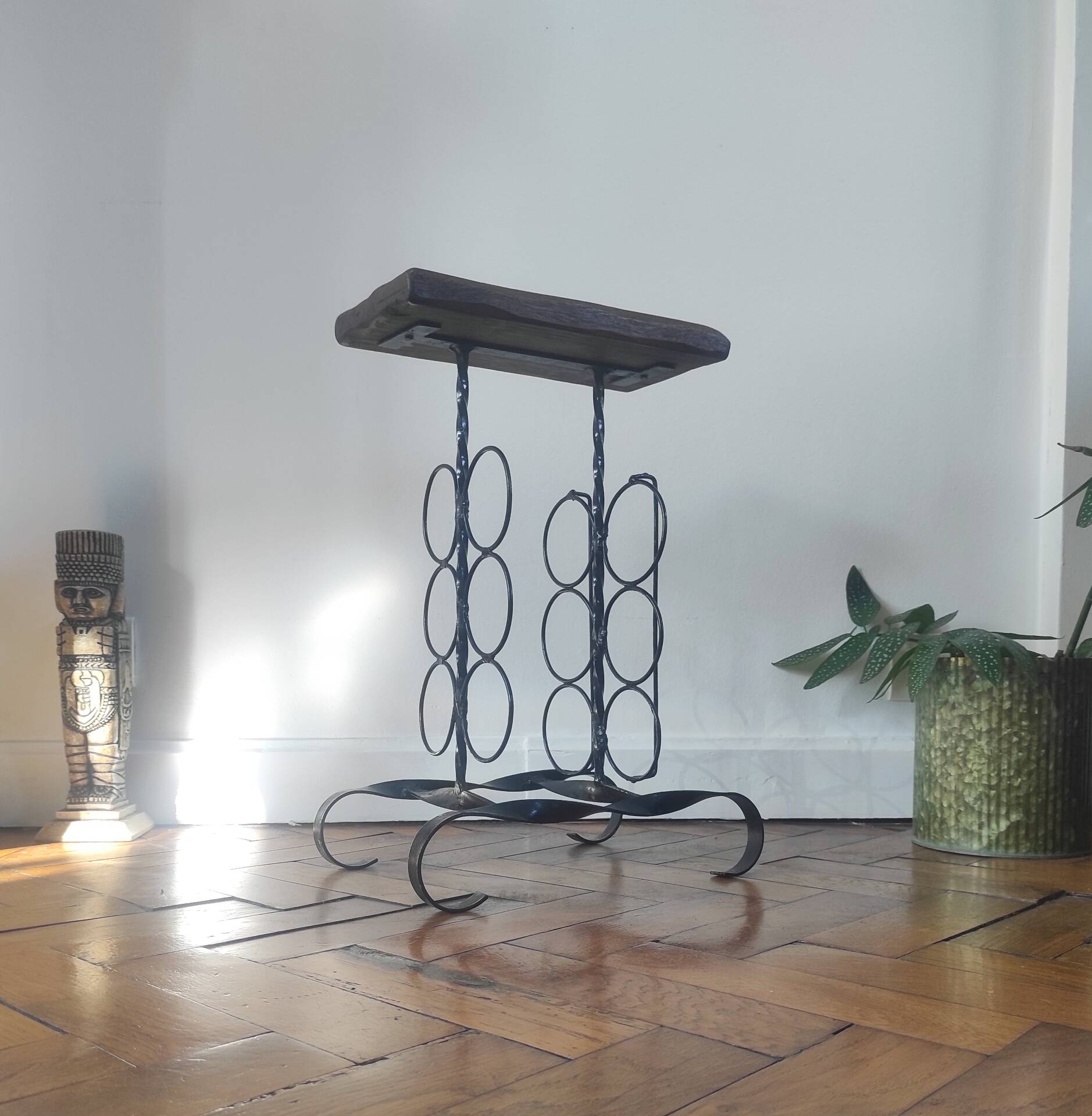 Side table, brutalist bottle holder in wrought iron and solid wood.