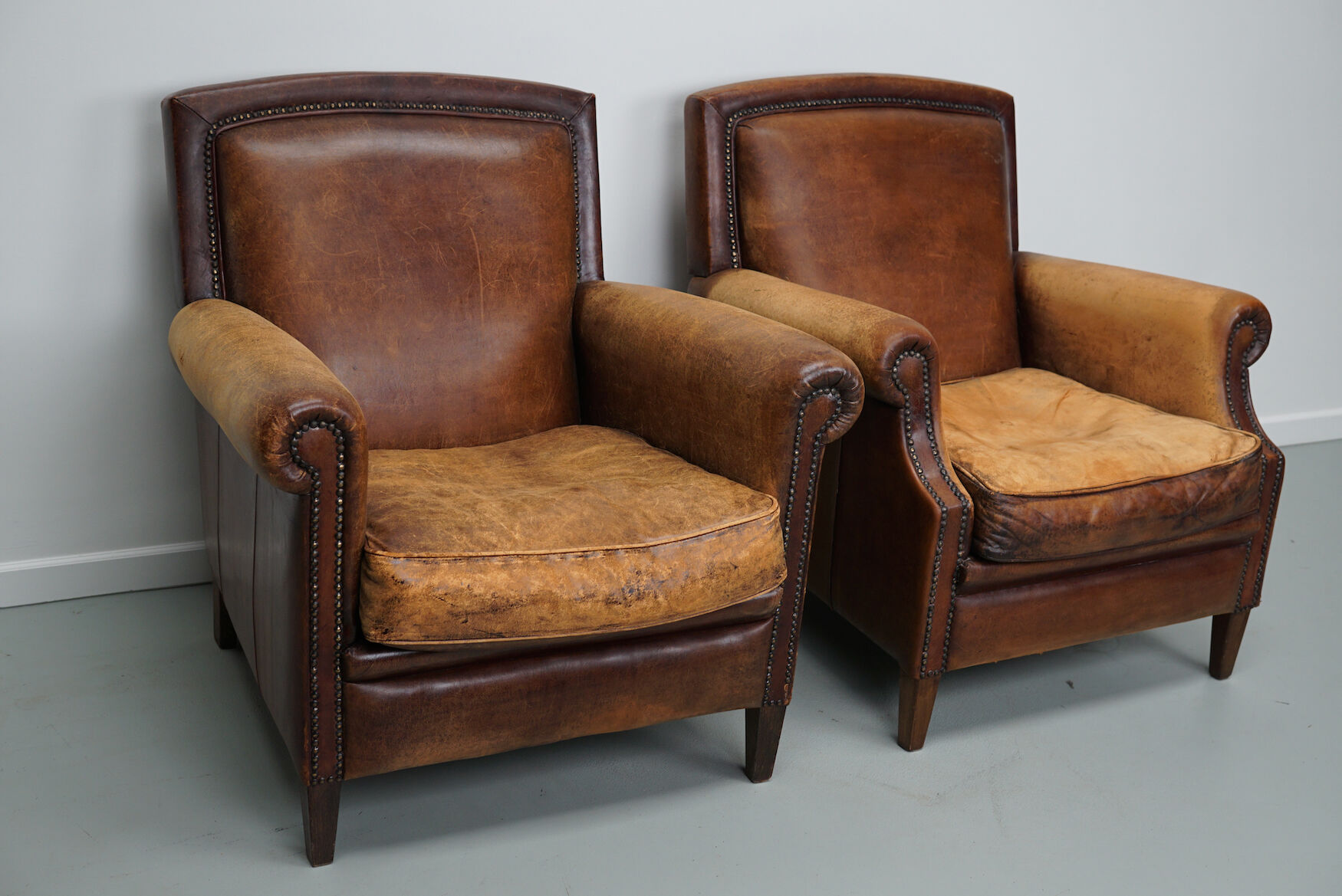 Vintage dutch cognac colored leather club chairs