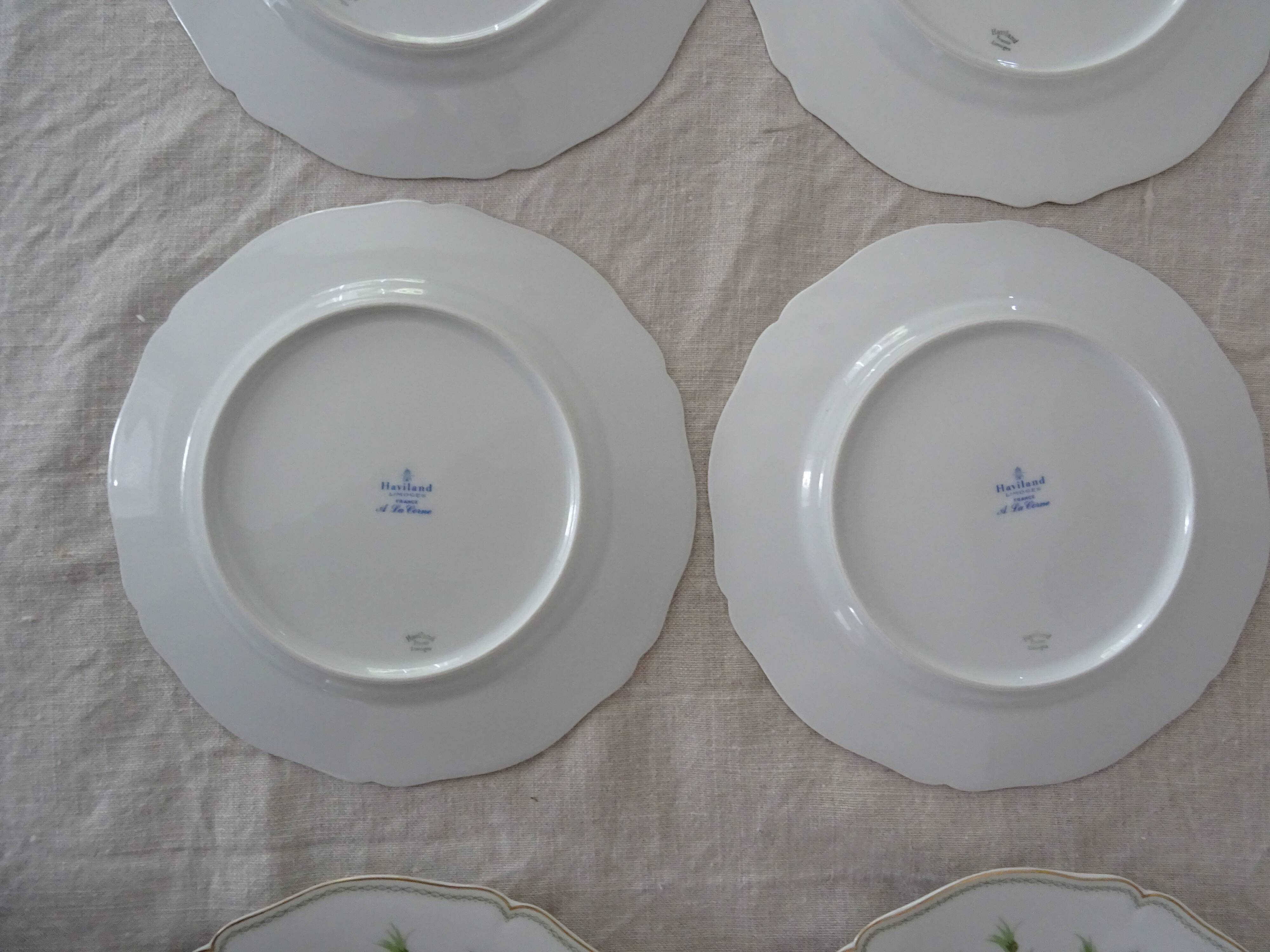 6 flat plates and 1 round dish haviland limoges with green and gold horn