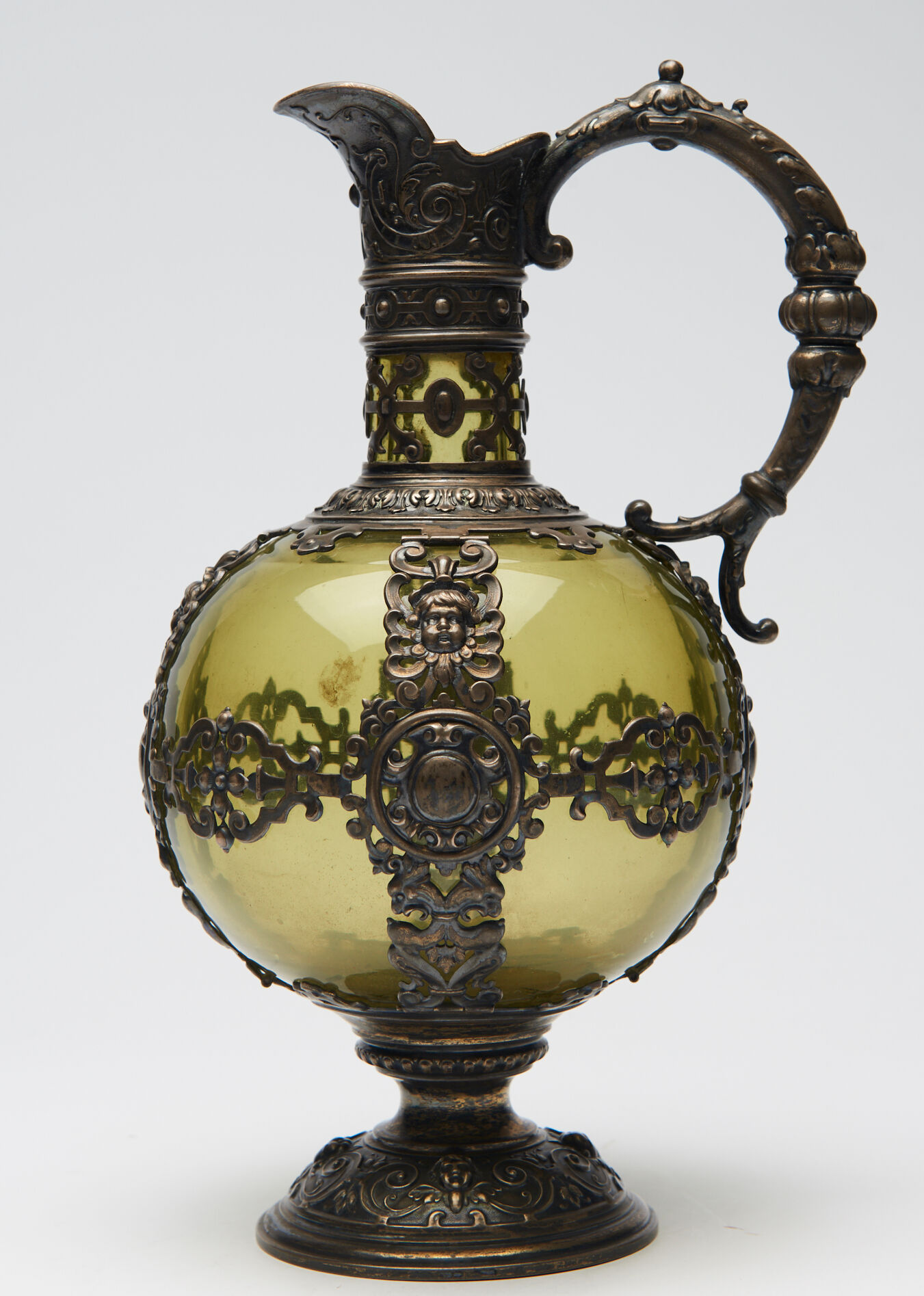 Nineteenth Renaissance style ewer in glass green and brass