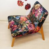 Restored armchair in varnished wood and fabric
