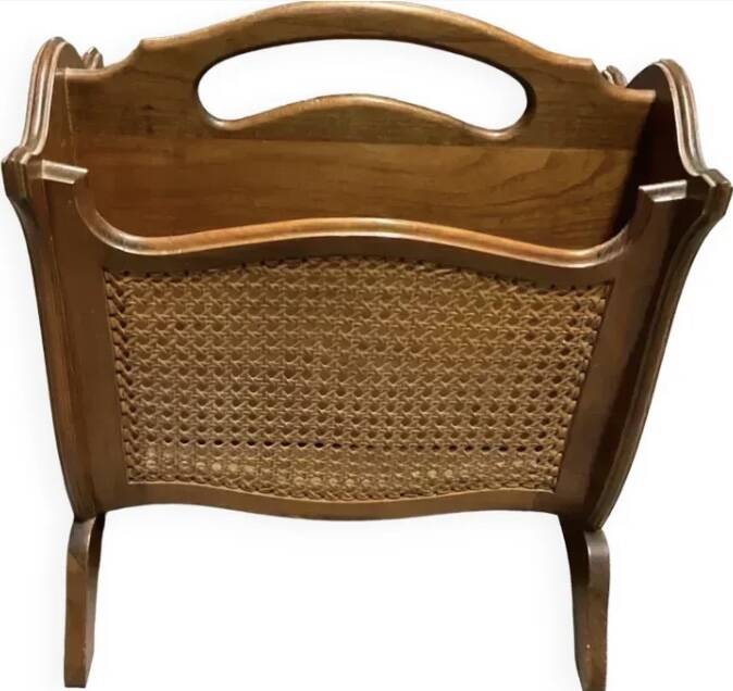 Vintage wicker newspaper rack