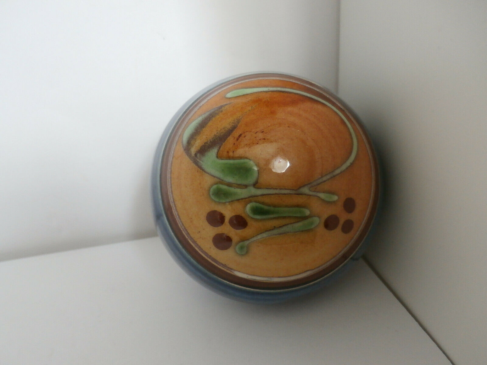 Glazed terracotta ball signed Otto Lindner