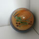 Glazed terracotta ball signed Otto Lindner