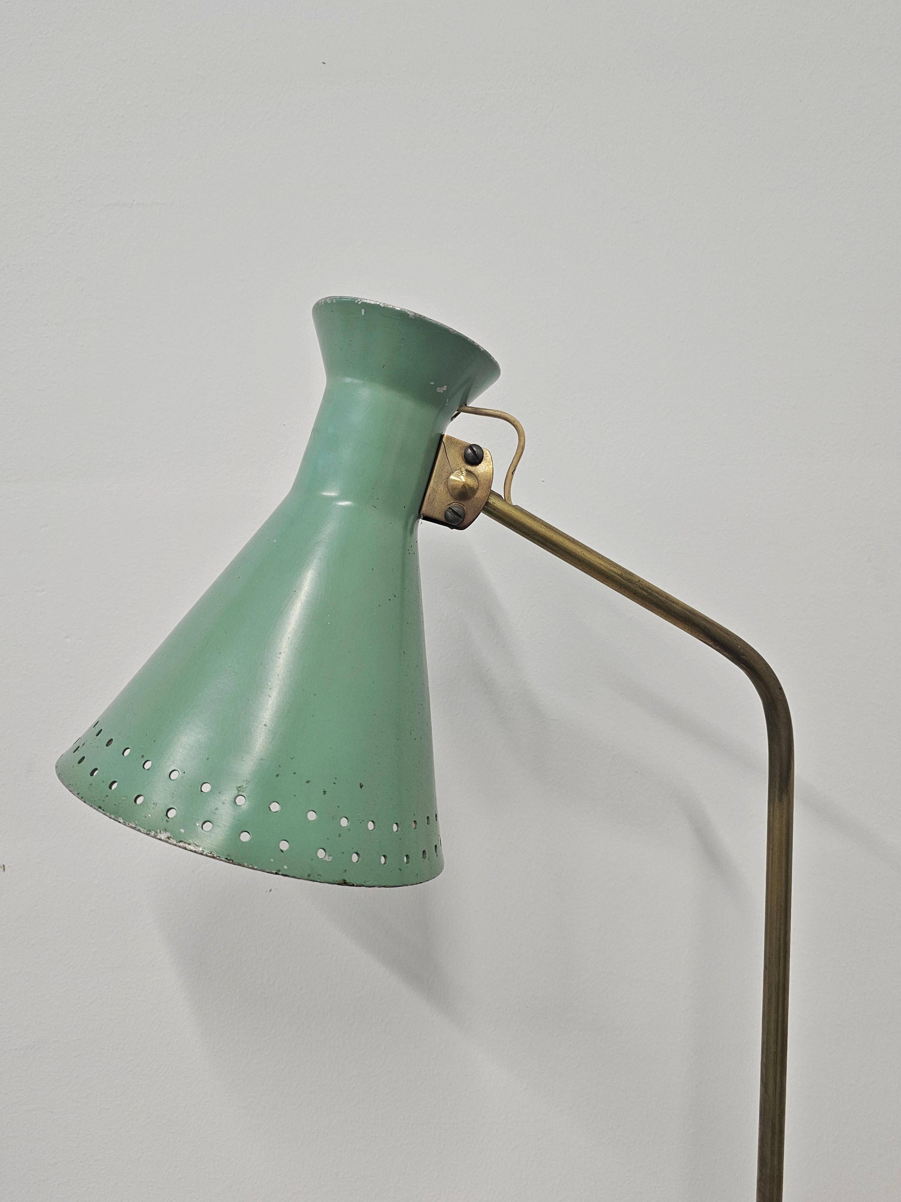 Mid-Century table lamp with a conical metal shade, attributed to Stilnovo.