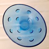 Empty cup blue glass pocket