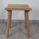 Nordic design wooden stool model ypperlig by ikea with a minimalist seat.