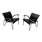 Pair of designer leather armchairs from the 70s/80s