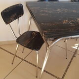 Table and 6 chairs in black formica marble effect