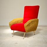 Red and mustard yellow fabric armchair in 1970s style